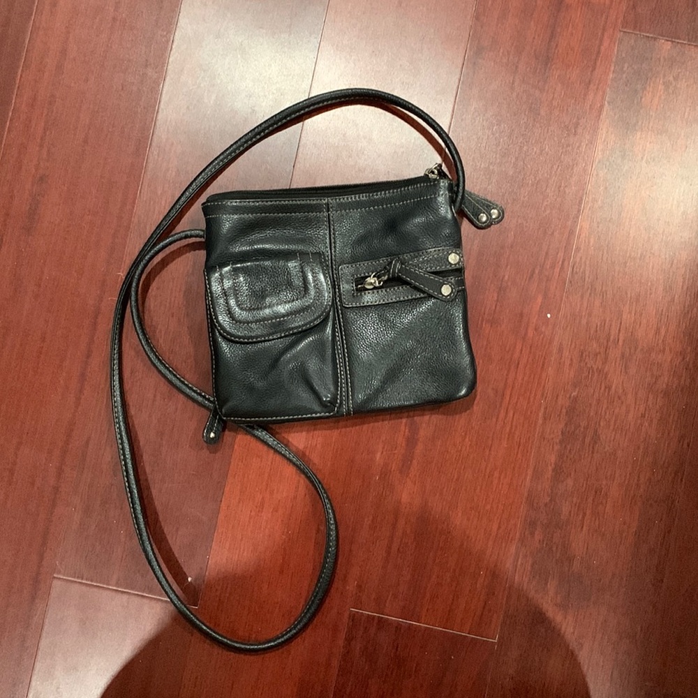 Like new Tignanello black purse. 100% real leather